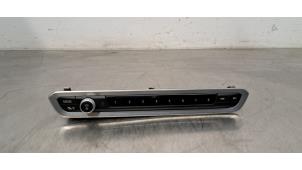 Gebruikte Radiobedienings paneel BMW X5 (G05) xDrive 45 e iPerformance 3.0 24V Prijs € 133,10 Inclusief btw aangeboden door Autohandel Didier