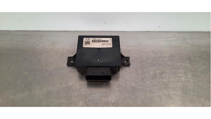 DC/CD convertisseur Mazda 3.