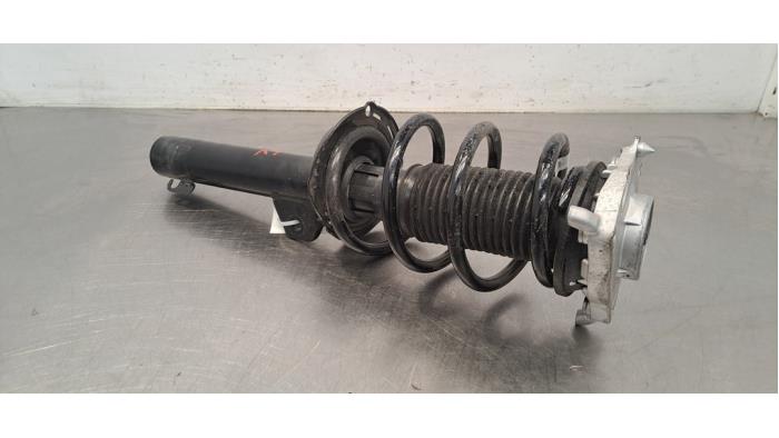 Schokdemper links-voor Audi Q4