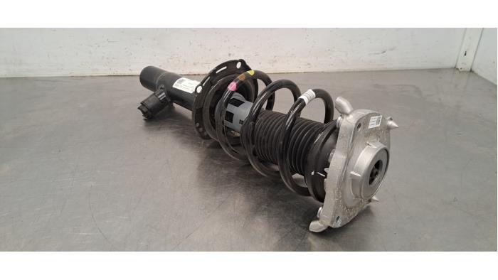 Schokdemper links-voor Audi Q4
