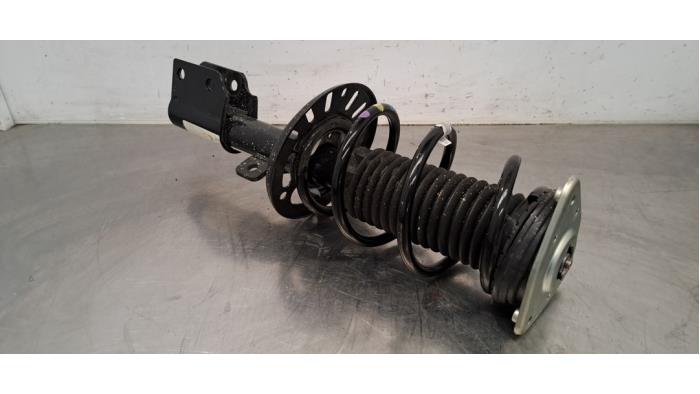 Fronts shock absorber, left Opel Combo