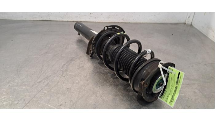 Fronts shock absorber, left Audi Q3