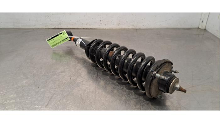 Fronts shock absorber, left Toyota Hilux