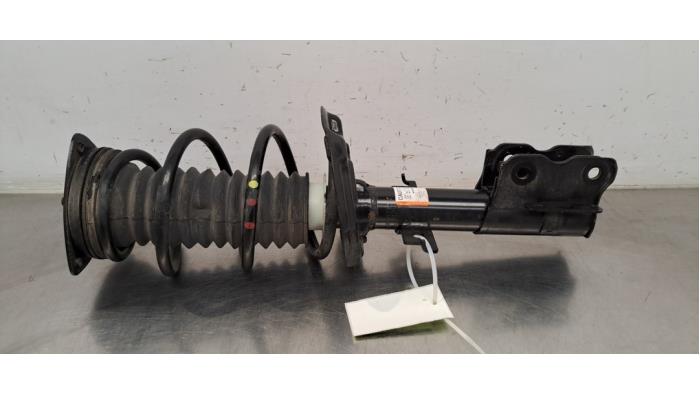 Rear shock absorber, left