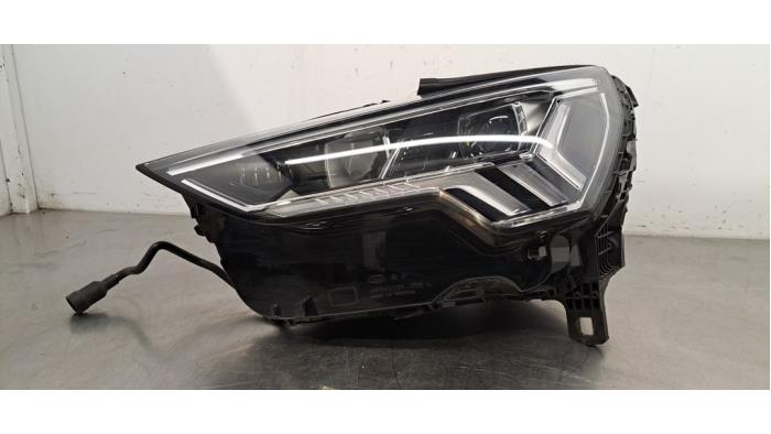 Reflektor lewy Audi Q3