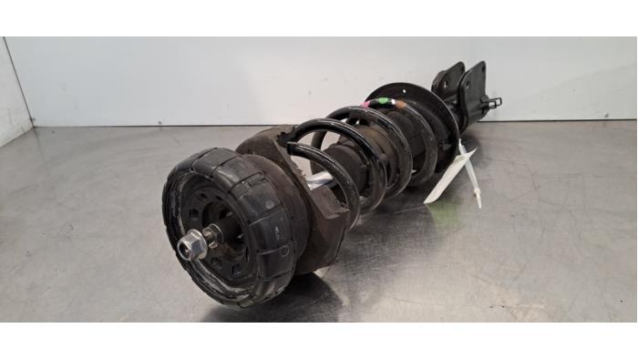 Fronts shock absorber, left Renault Trafic