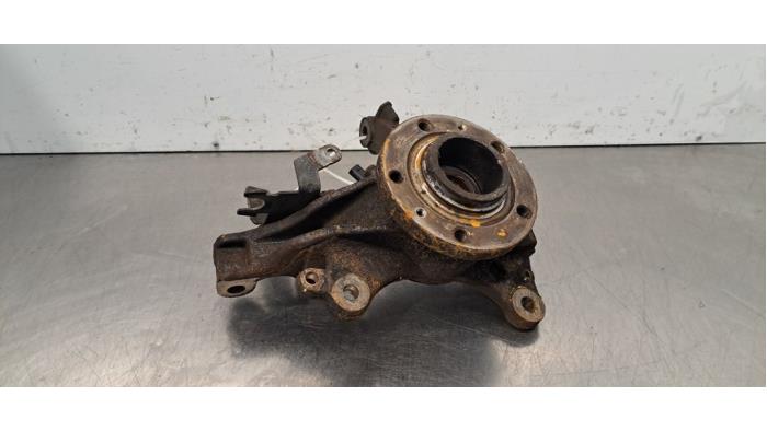 Knuckle, front left Opel Combo