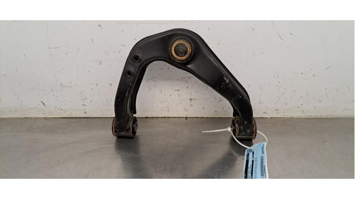 Bras de suspension avant droit Renault Alaskan