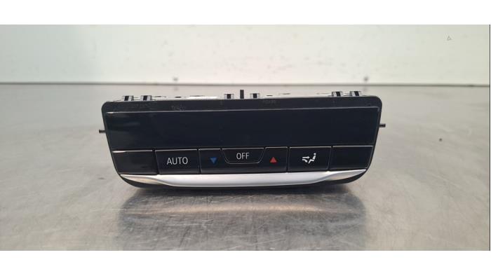 Airco bedieningspaneel van een BMW 4 serie (G22) 420i 2.0 TwinPower Turbo 16V 2025