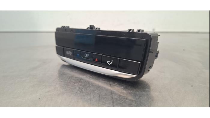 Airco bedieningspaneel van een BMW 4 serie (G22) 420i 2.0 TwinPower Turbo 16V 2025