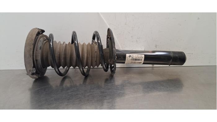 Fronts shock absorber, left BMW 1-Serie