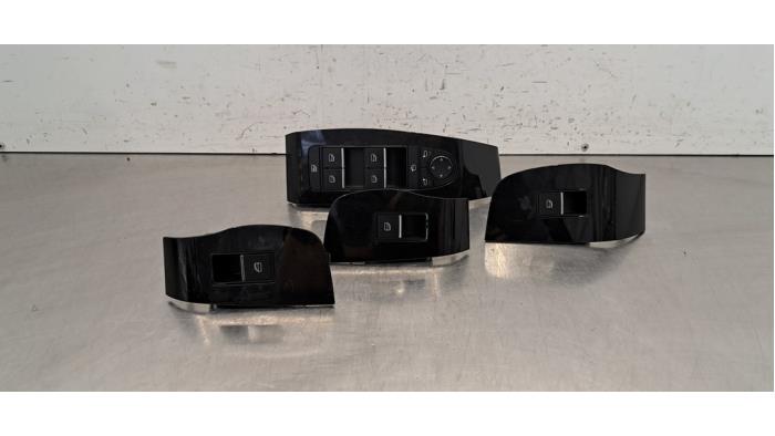 Commutateur combi vitres Mazda 3.