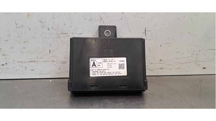 Module verrouillage central des portes Mazda 3.
