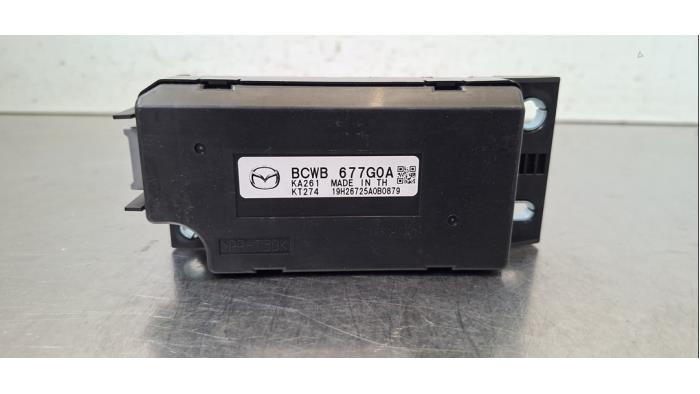 Module (divers) Mazda 3.