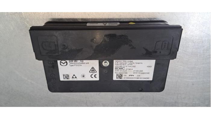 Module de communication Mazda 3.