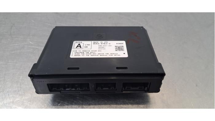 Module verrouillage central des portes Mazda 3.