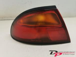 Gebruikte Achterlicht links Mazda 323 F (BA14) 1.8i GLX,GT 16V Prijs € 13,50 Margeregeling aangeboden door DP Auto-onderdelen & Demontage