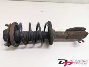 Gebruikte Schokdemperpoot links-voor Mazda 323 F (BA14) 1.8i GLX,GT 16V Prijs € 14,00 Margeregeling aangeboden door DP Auto-onderdelen & Demontage