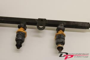 Injector brug van een Daewoo Tacuma 1.8 Pure,SE,SX 2001
