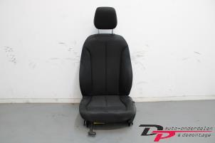 Gebruikte Voorstoel links BMW 1 serie (F20) 114d 1.6 16V Prijs € 99,00 Margeregeling aangeboden door DP Auto-onderdelen & Demontage