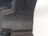 Koplampframe links van een Mitsubishi Colt CZC 1.5 16V 2007