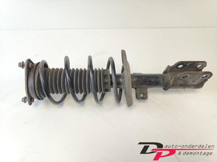 Schokdemperpoot links-voor van een Peugeot 308 SW (L4/L9/LC/LJ/LR) 1.6 BlueHDi 120 2014