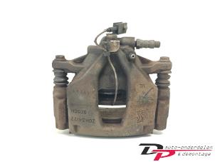 Gebruikte Remklauw (Tang) links-voor Fiat Punto Evo (199) 1.3 JTD Multijet 85 16V Euro 5 Prijs € 14,00 Margeregeling aangeboden door DP Auto-onderdelen & Demontage