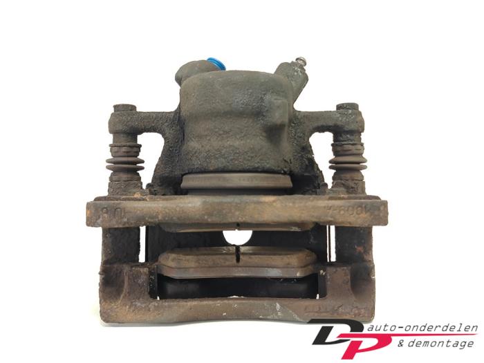 Remklauw (Tang) rechts-voor van een Suzuki Splash 1.0 12V 2009