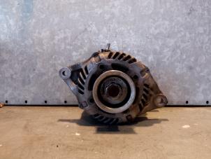Gebruikte Alternator Mitsubishi Space Star (A0) 1.2 12V Prijs € 90,00 Margeregeling aangeboden door Uittenbogaard onderdelen BV
