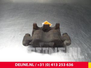 Iveco Daily Front brake calliper, left O52935 photo 2