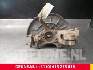 Volkswagen Caddy Fusee links-voor O52079 foto 2