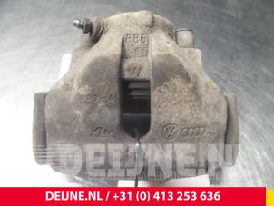 Audi A4 Bremszange links vorne O52662 foto 2