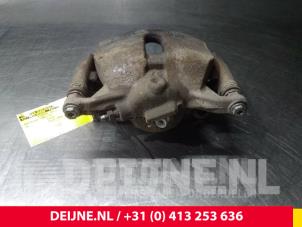 Volkswagen Caddy Front brake calliper, left O52816 photo 2