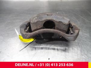 Nissan NV200 Bremszange links vorne O52909 foto 2
