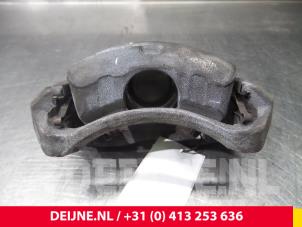 Nissan NV200 Bremszange links vorne O52910 foto 2