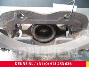 Nissan NV200 Bremszange links vorne O52911 foto 3