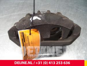 Nissan Cab Star Front brake calliper, left O52914 photo 2