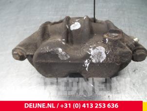 Nissan Cab Star Front brake calliper, left O52914 photo 3