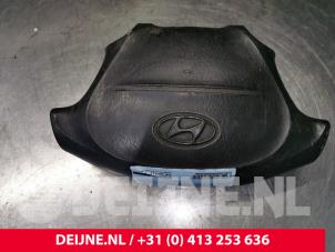Hyundai H200 Left airbag (steering wheel) O54996 photo 2
