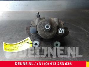 BMW X1 Remklauw (Tang) links-achter O70101 foto 2