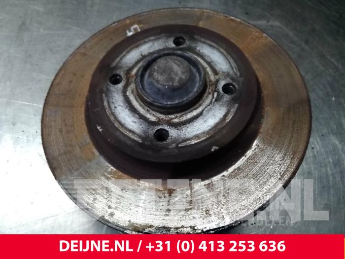 Citroen Berlingo Fusee links-achter O71568