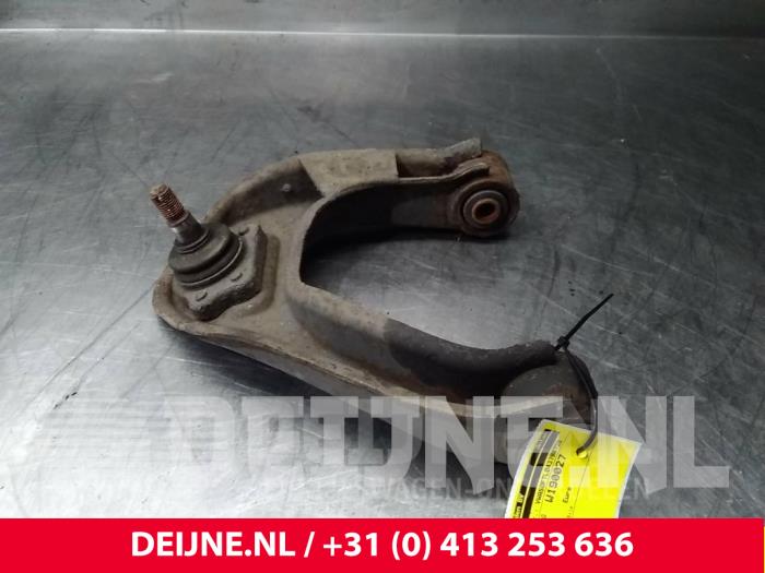 Nissan Cab Star Draagarm Boven links-voor O71586
