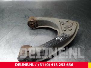 Nissan Cab Star Front upper wishbone, left O71586 photo 2