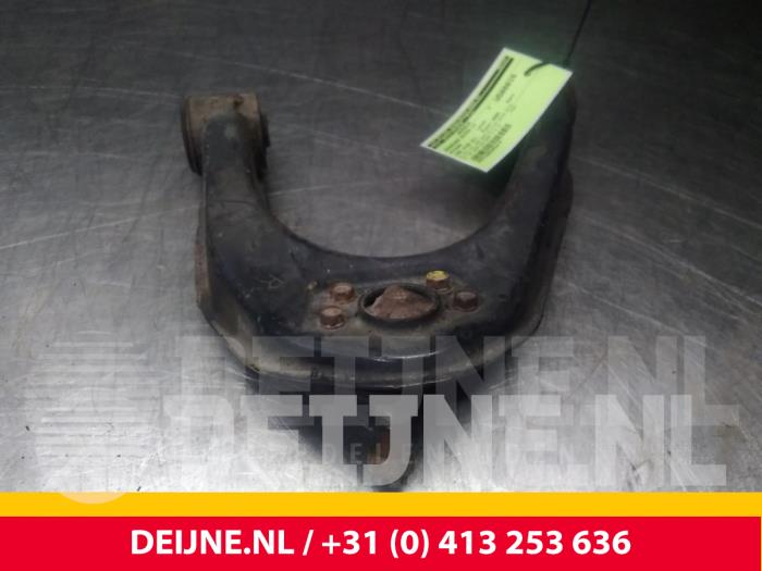 Nissan Cab Star Draagarm Boven links-voor O71588