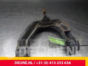 Nissan Cab Star Front upper wishbone, left O71589 photo 3