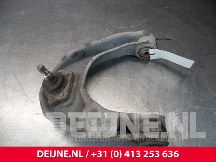 Nissan Cab Star Front upper wishbone, right O71632