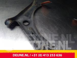 Volkswagen Caddy Front lower wishbone, left O71792 photo 2