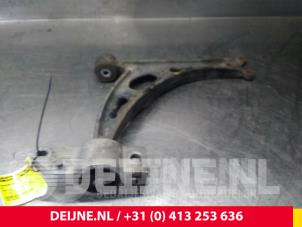 Volkswagen Caddy Draagarm onder rechts-voor O71986 foto 2