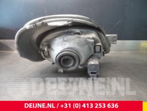 Opel Vivaro Koplamp links O33566 foto 2