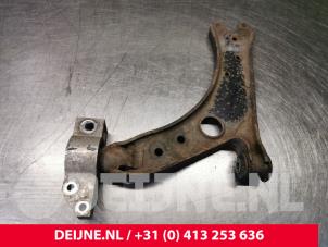 Volkswagen Caddy Draagarm onder rechts-voor O79094 foto 2